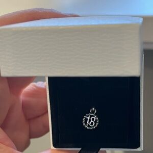 NIB Pandora, silver “18” charm.